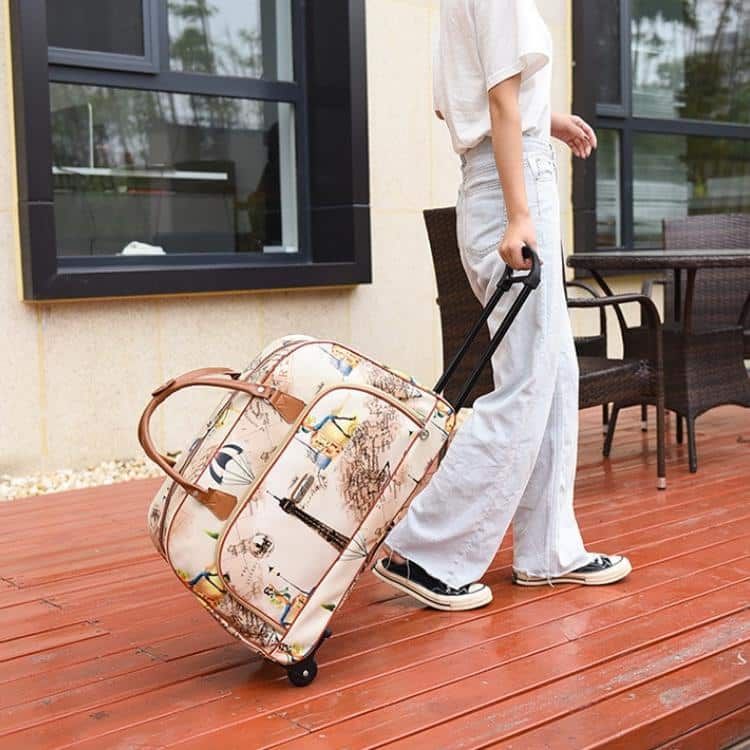 bagages à roulettes beige pour voyage