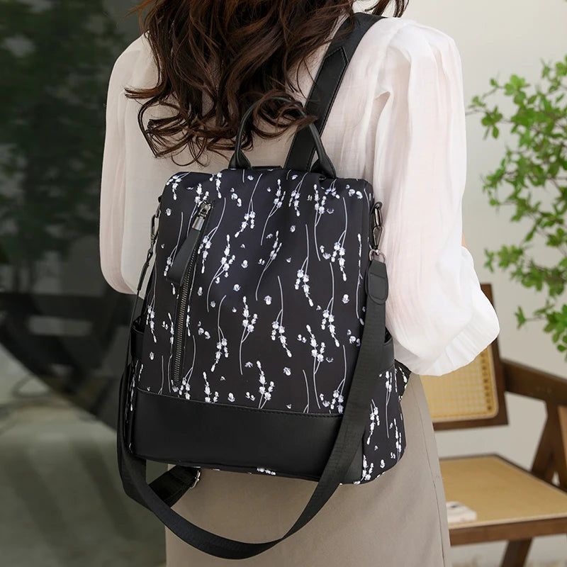 sac à dos avec motif fleuri pour femme