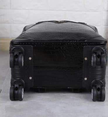 sac à roulettes femme en similicuir noir