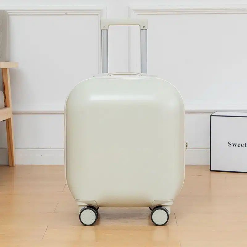 sac de voyage à roulettes de cabine blanc pour femme
