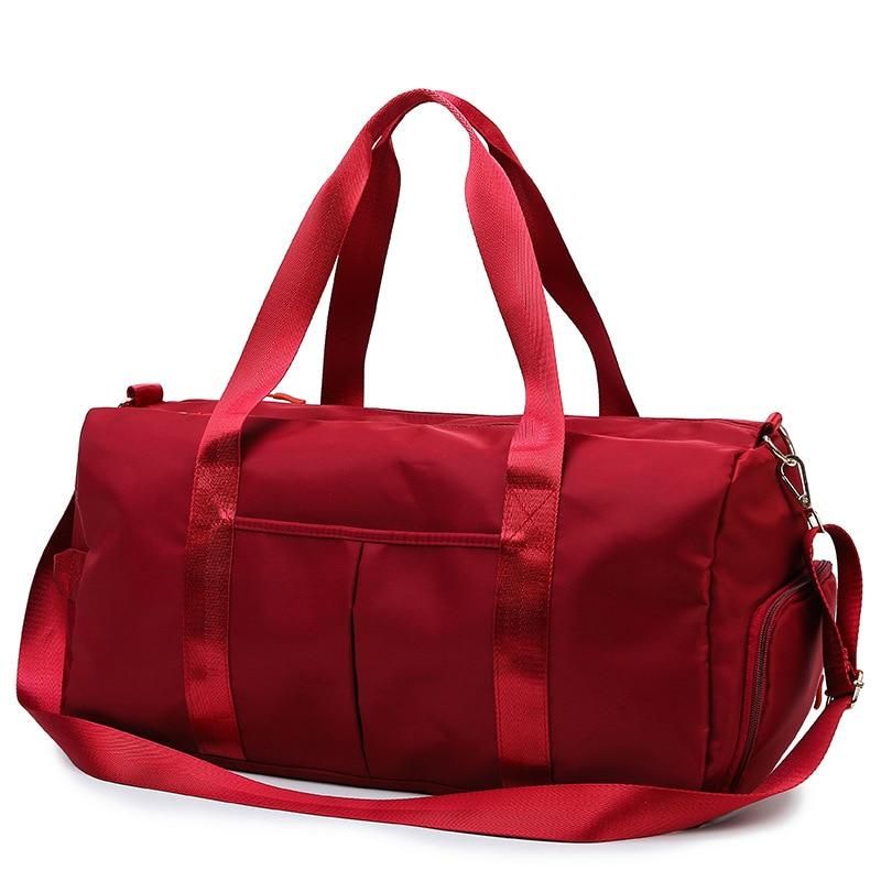 sac de voyage avec compartiment chaussures rouge