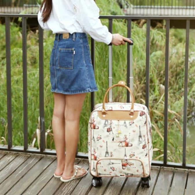 sac de voyage féminin beige avec roulettes