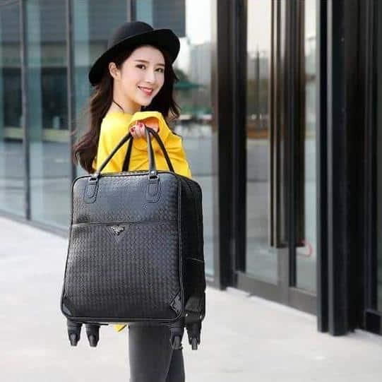 sac de voyage noir femme en similicuir