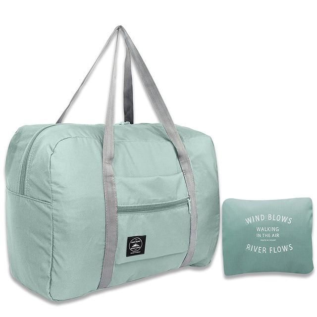 sac de voyage pliable "wind blow river flows" vert d'eau