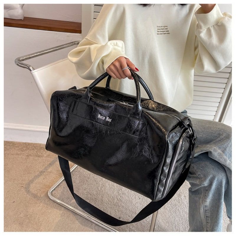 sac en simili cuir noir brillant