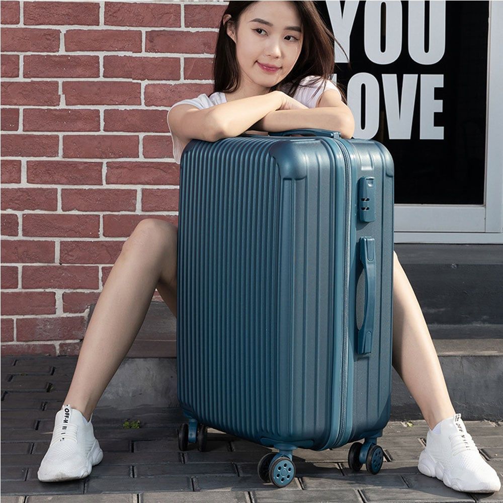 valise à roulettes bleue résistante à l'eau