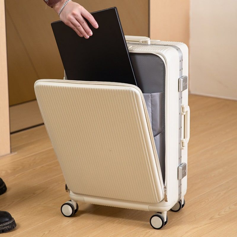 valise en plastique avec roulettes et cadre en aluminium