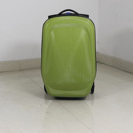 valise en plastique trottinette verte